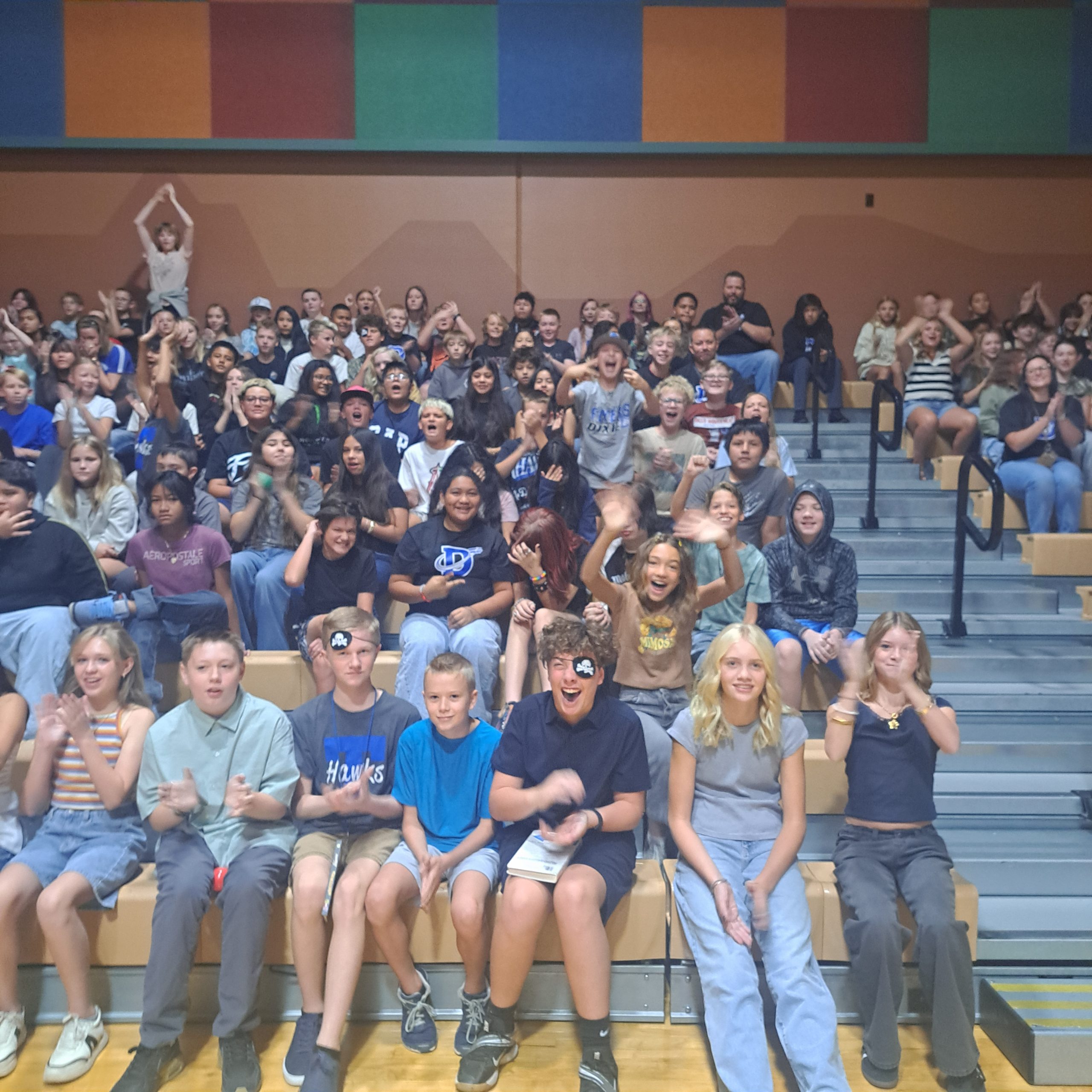 7th graders on bleachers for Dixie's first spirit assembly